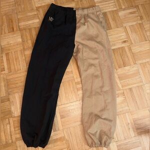 Tan and black luxury sweatpants. The Mayfair group